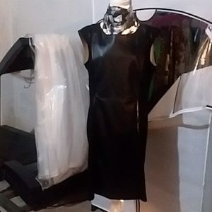 Sleeveless black evening dress.